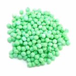 Green candy clusters against a white background.